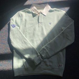 Scott Ellis branded rugby long sleeve shirt. Size medium.